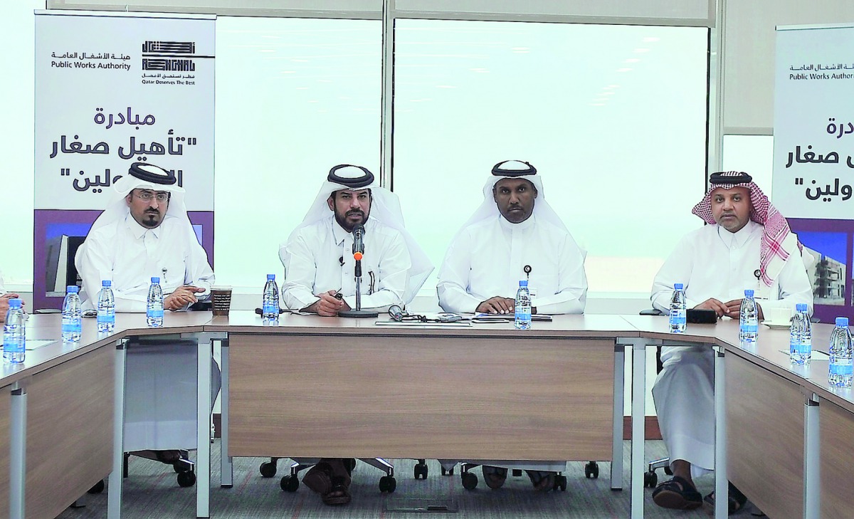 Eng Saud Al Tamimi (second left), Director of Roads Projects, and Ghanim Al Mansouri (second right), Director of Contracts Department, with other officials during a press conference at Ashghal Tower yesterday. Pic: Baher Amin/The Peninsula