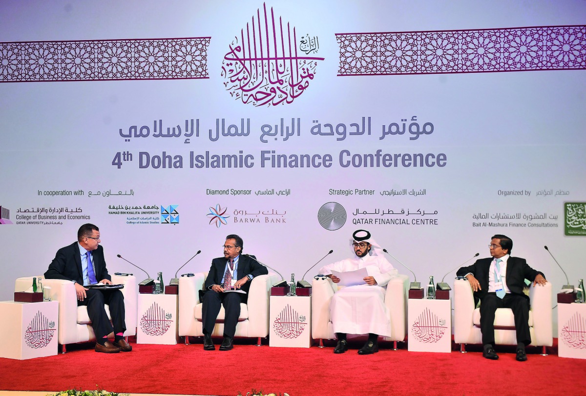FROM LEFT: Ahmed Hafez, Moderator; Dr Sayed Nizam Ali, Director and Research Professor at HBKU; Dr Haitham Al Salama, Chief Economic Adviser at QFC Authority; and Gourang Hemani, Chief Financial Officer at QIB; in a panel discussion during the 4th Doha Is