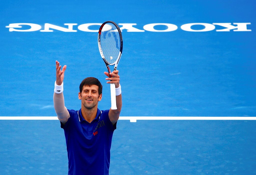 Serbia's Novak Djokovic reacts to the crowd after winning his match against Austria's Dominic Thiem. REUTERS/David Gray