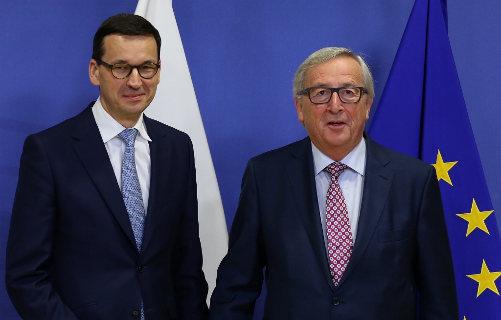 President of European Commission Jean Claude Juncker and Prime Minister of Poland Mateusz Morawiecki hold a joint press conference after their meeting in Brussels on January 9, 2018. ( Dursun Aydemir - Anadolu Agency )