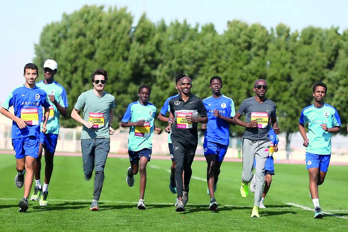 Four-time Olympic champion Mo Farah and other running stars train with young Aspire Academy’s athletes yesterday. 