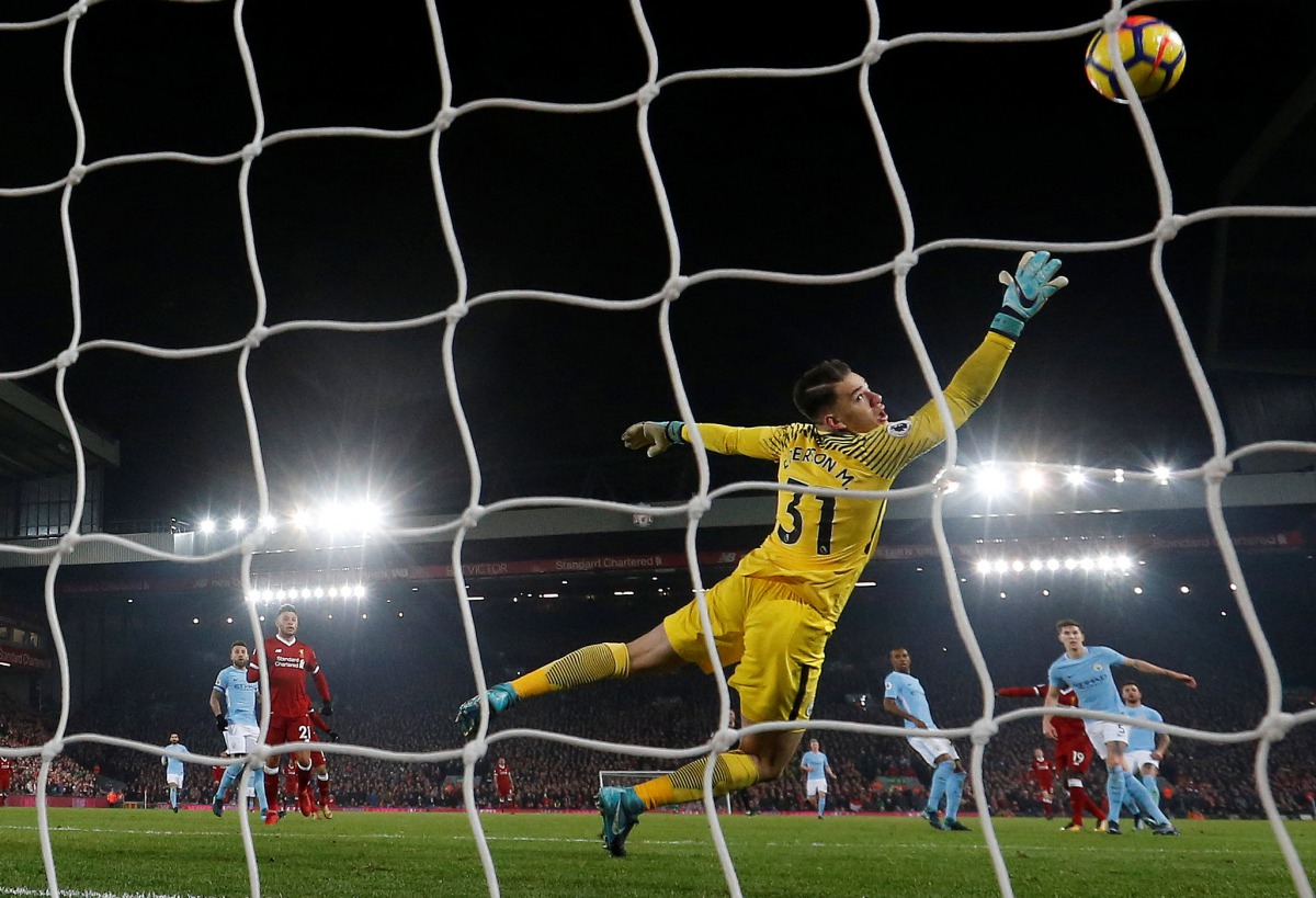 Manchester City's Ederson looks on as Liverpool's Sadio Mane scores their third goal Action Images via Reuters/Carl Recine