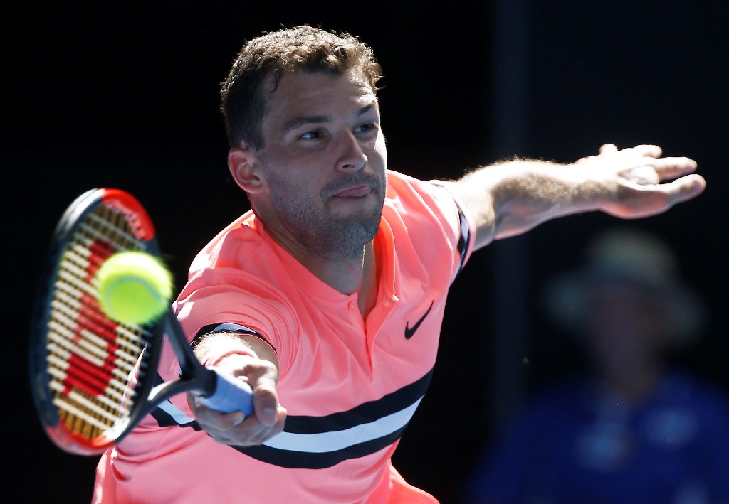Tennis - Australian Open - Grigor Dimitrov of Bulgaria v Dennis Novak of Austria - Rod Laver Arena, Melbourne, Australia, January 15, 2018. Dimitrov hits a shot. REUTERS/Thomas Peter
