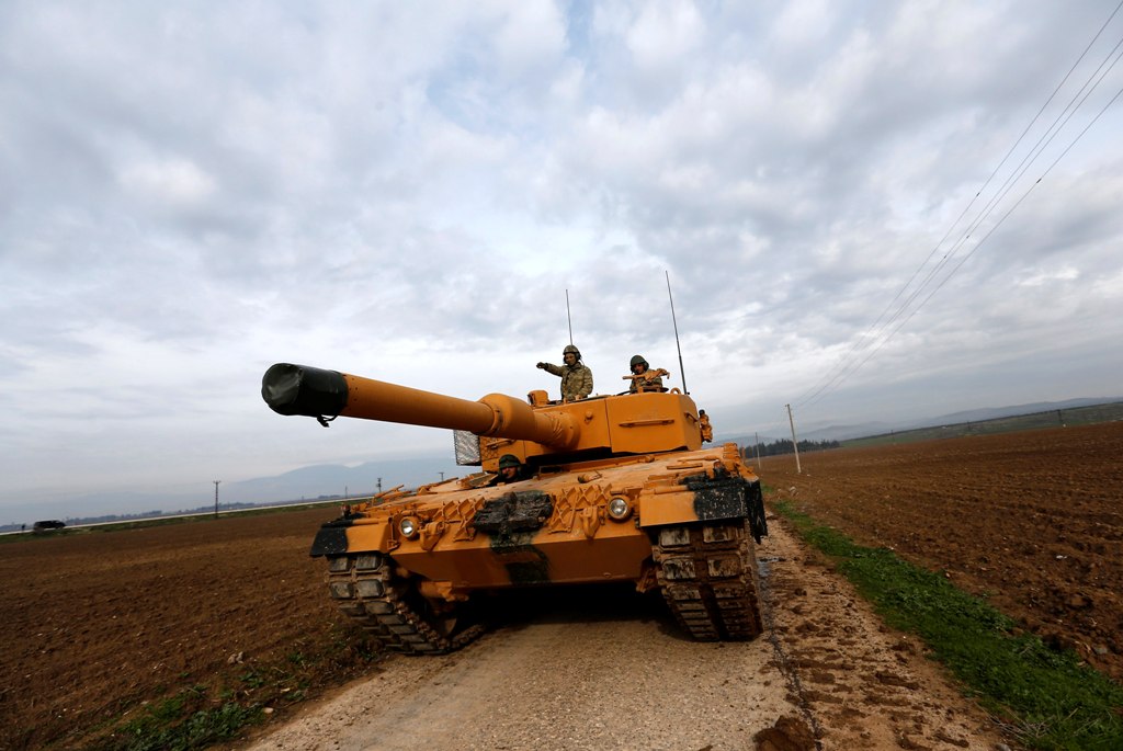 Turkish soldiers prepare their tanks near the Syrian-Turkish border, at Reyhanli district in Hatay, Turkey, 21 January 2018. EPA/SEDAT SUNA
