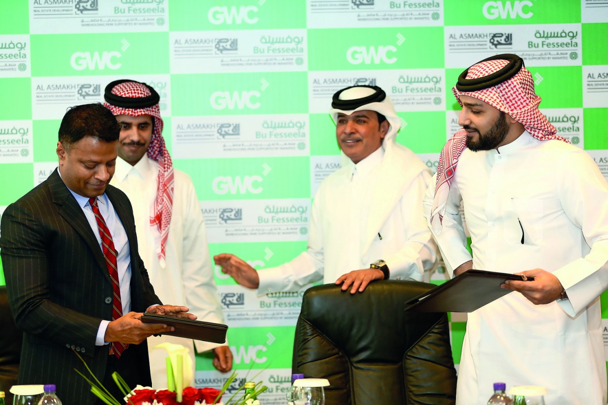 Officials of GWC and Al Asmakh Real Estate Development during the signing ceremony held at GWC headquarters.