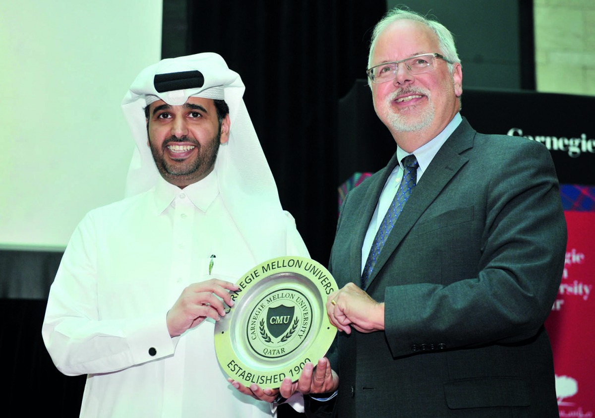Abdulaziz bin Nasser Al Khalifa, QDB CEO presented with a shield by Michael Trick, Dean of Carnegie Mellon during Dean’s Lecture Series held at Carnegie Mellon University- Qatar, yesterday.