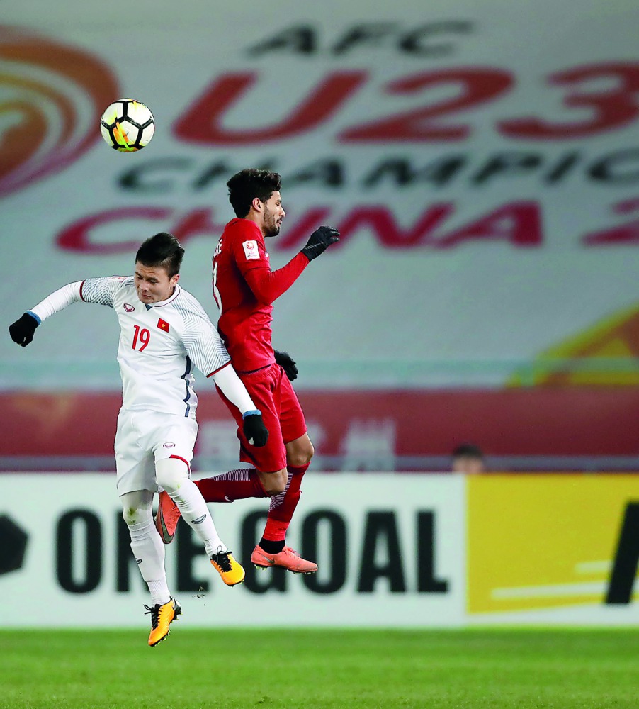 Action from the Under-23 ASian Cup  semi-final match between Qatar and Vietnam in Changzhou, China yesterday. Vietnam won 6-5 in the penalty shoot-out.