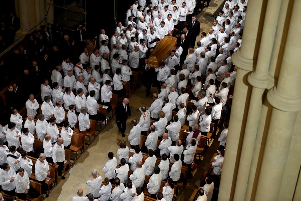 Chefs carry the coffin of late French chef Paul Bocuse during the funeral ceremony at the Saint-Jean Cathedral in Lyon, France, January 26, 2018. REUTERS/Philippe Desmazes/Pool