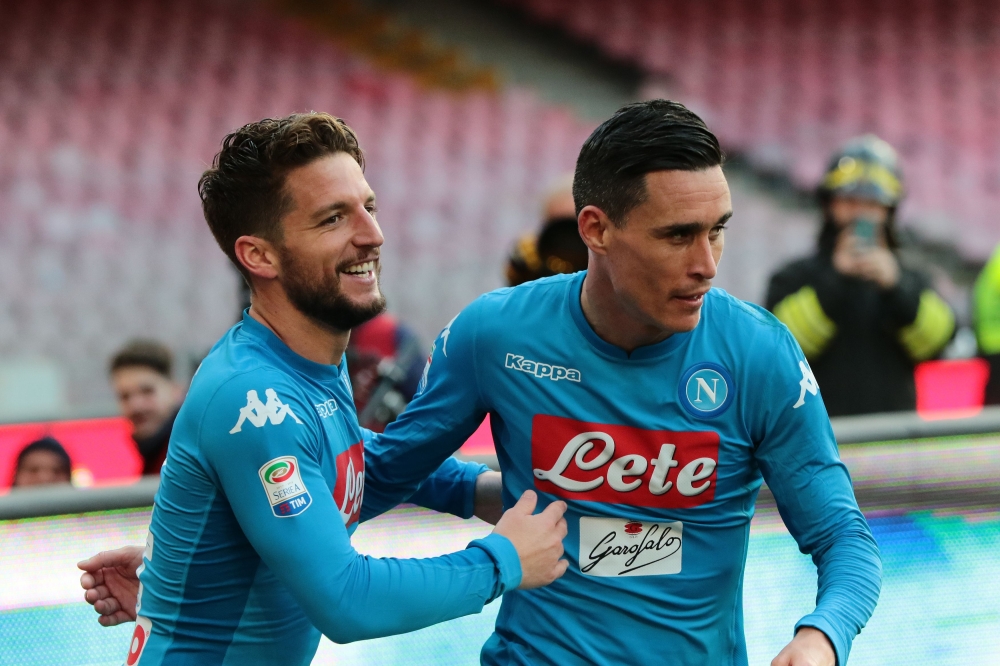 Napoli's forward from Belgium Dries Mertens (L) celebrates with teammate Napoli's midfielder from Spain Jose Maria Callejon after scoring during the Italian Serie A football match SSC Napoli vs Bologna FC on January 28, 2018 at the San Paolo Stadium. / AF