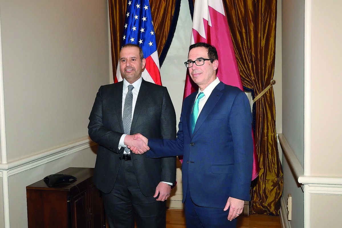 HE Sheikh Ahmed bin Jassem bin Mohammed Al Thani (left), Minister of Economy and Commerce, with US Secretary of the Treasury Steven Mnuchin, in Washington DC, US, yesterday.