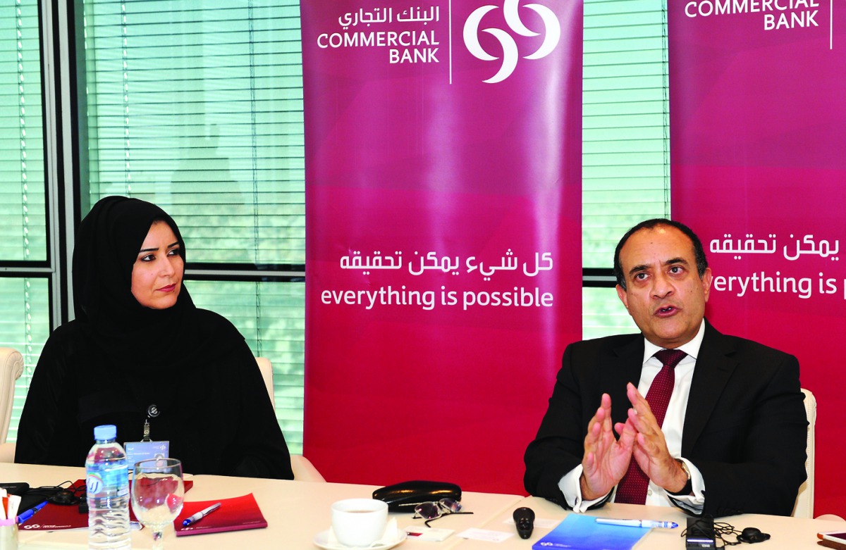 The CEO of Commercial Bank Joseph Abraham (right) along with Abeer Marwan Al Kalla, Head of Marketing Communication and Branding, addressing the media  at the Commercial Bank Plaza, West Bay, in Doha yesterday. Pic: Salim Matramkot/The Peninsula