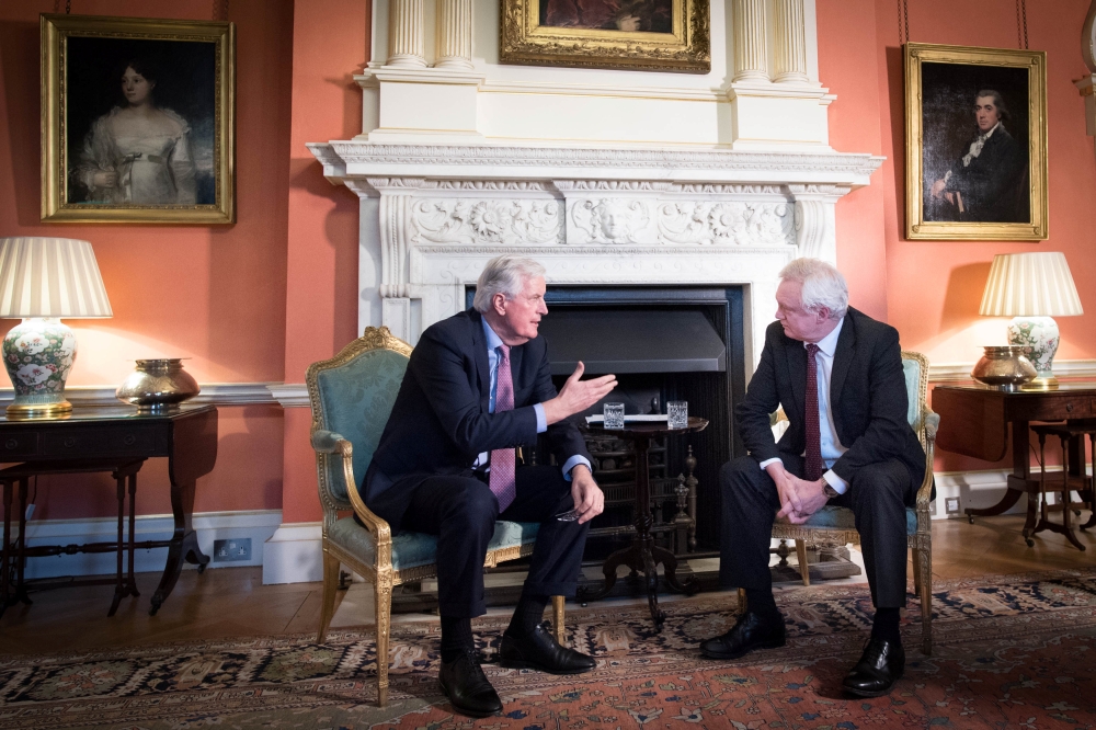 Britain's Secretary of State for Exiting the European Union David Davis and the European Union's chief Brexit negotiator Michel Barnier speak inside 10 Downing Street, London February 5, 2018. Reuters/Stefan Rousseau