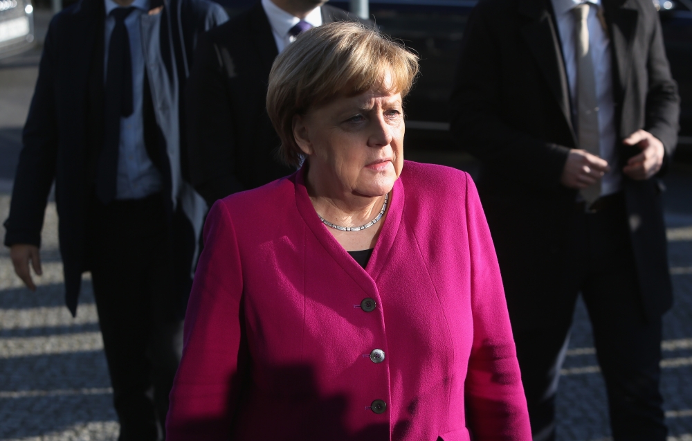 German Chancellor Angela Merkel, leader of the conservative Christian Democratic Union (CDU), arrives for further talks to form a new government in Berlin on February 6, 2018. AFP / Adam BERRY