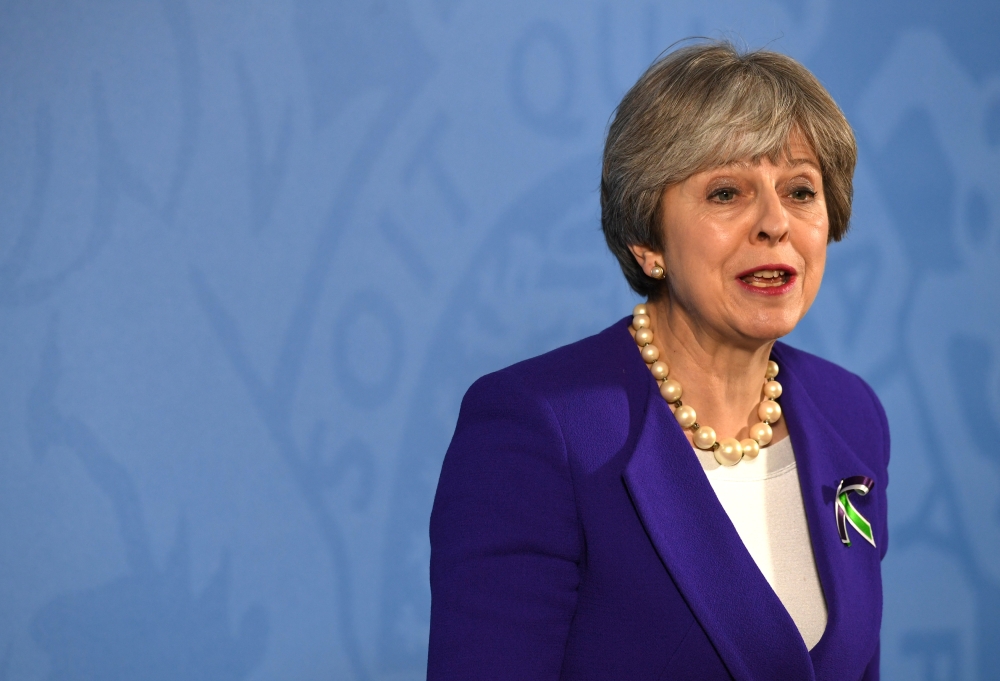 Britain's Prime Minister Theresa May gives a speech in Manchester, February 6, 2018. REUTERS/Paul Ellis/Pool
