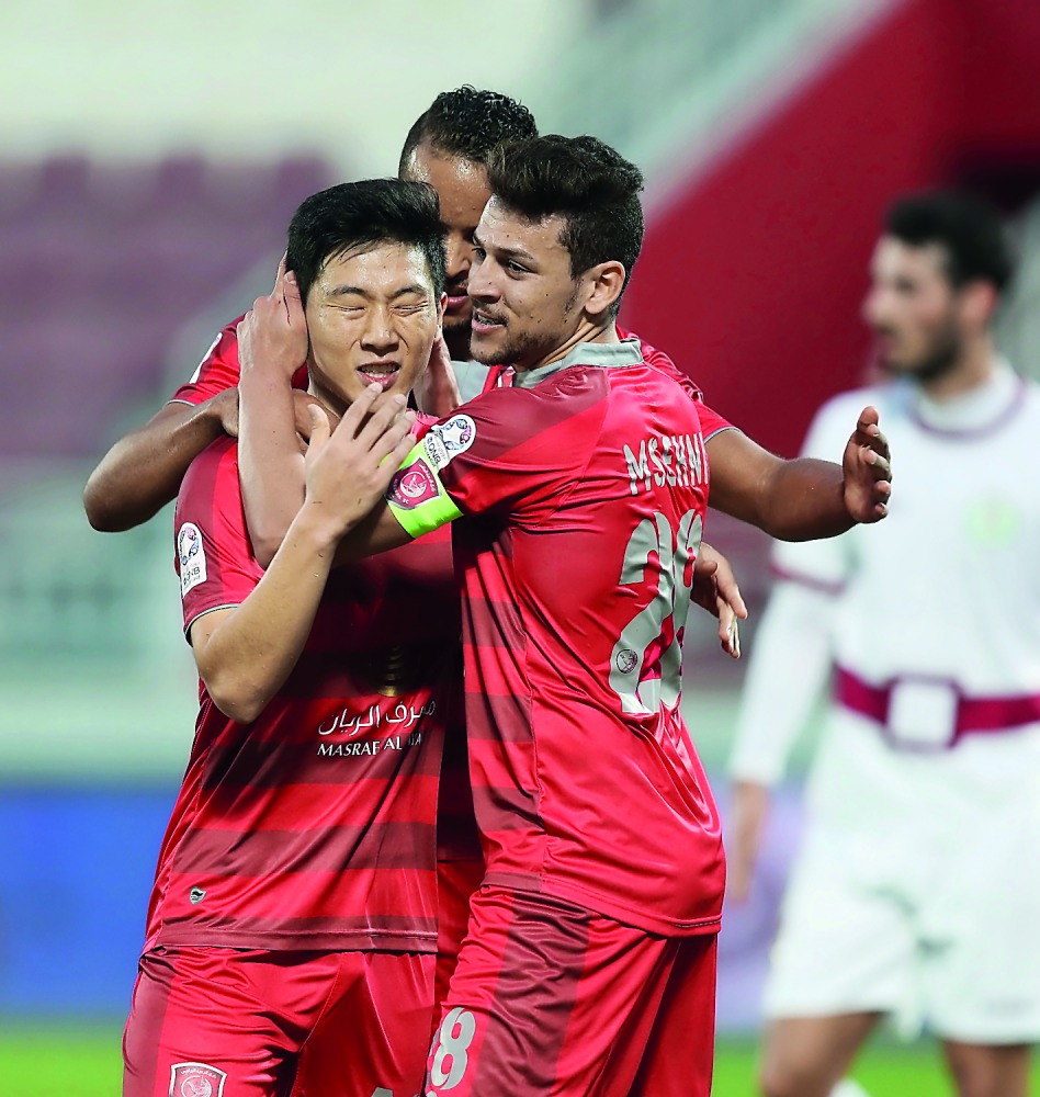 Al Duhail players celebrate after scoring a goal in this file photo.