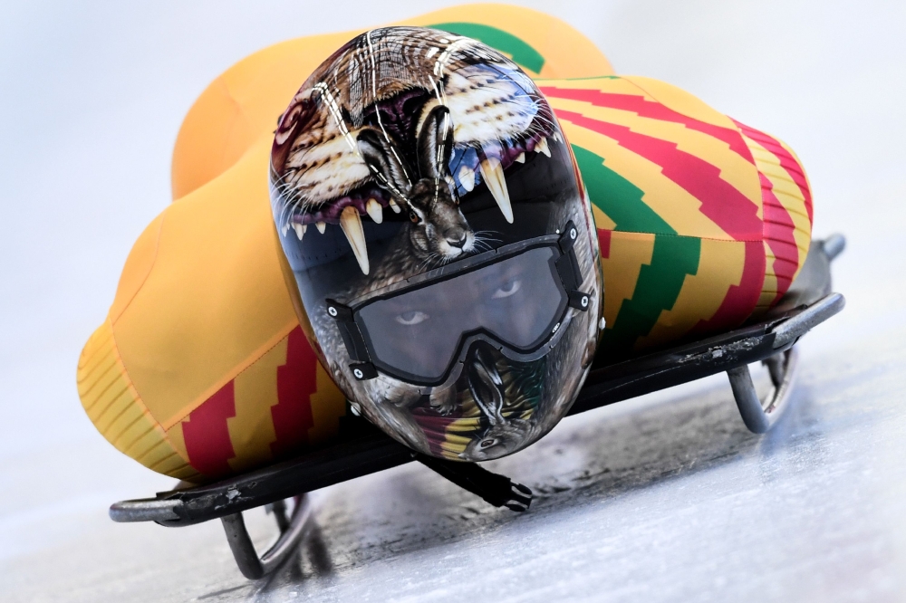 Ghana's Akwasi Frimpong takes part in a training session for the men's skeleton event at the Olympic Sliding Centre, during the Pyeongchang 2018 Winter Olympic Games in Pyeongchang, on February 11, 2018. / AFP / Kirill KUDRYAVTSEV 