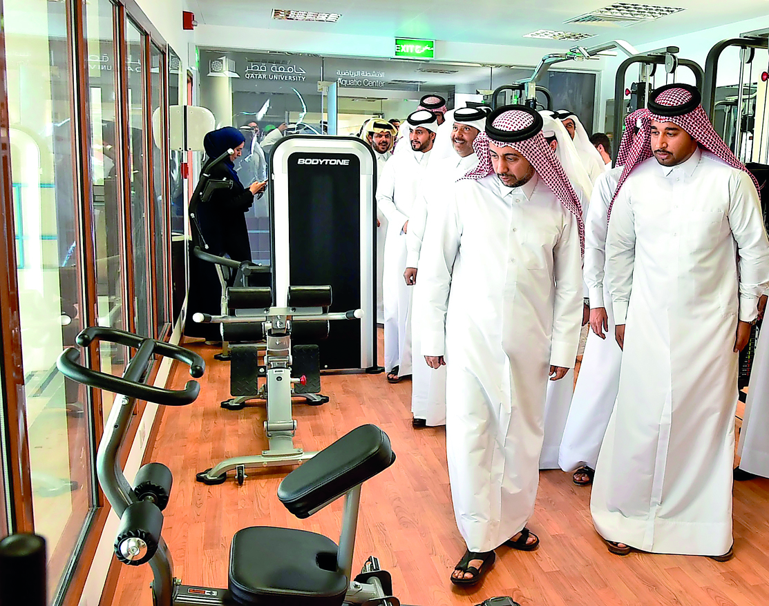 QU President Dr Hassan Al Derham and other officials touring the gymnasium. 