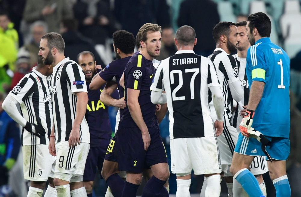 Tottenham Hotspur's English striker Harry Kane (C) looks on after the UEFA Champions League round of sixteen first leg football match between Juventus and Tottenham Hotspur at The Allianz Stadium in Turin on February 13, 2018. / AFP / Miguel MEDINA