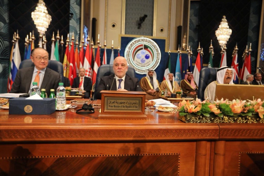Iraqi Prime Minister Haider al-Abadi (C) attends the Kuwait International Conference for Reconstruction of Iraq, in Bayan, Kuwait February 14, 2018. 
