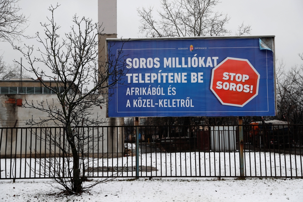 A government billboard is seen in Budapest, Hungary, February 14, 2018. The billboard reads: 'Soros wants to transplant millions from Africa and the Middle East'. Reuters/Bernadett Szabo