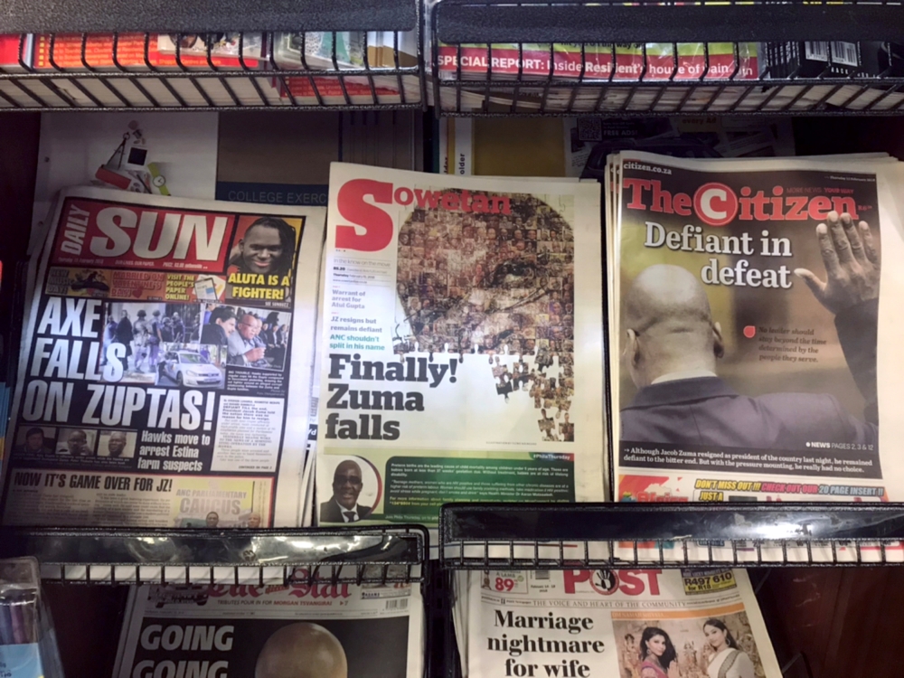 South African newspapers, displaying news of Jacob Zuma’s resignation as president, are seen in a shop in Johannesburg, South Africa February 15, 2018. Reuters/Marius Bosch