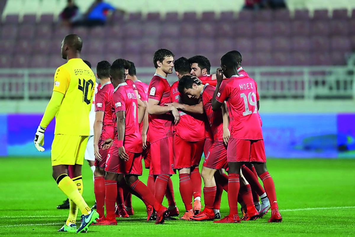 Al Duhail players celebrate after winning their QNB Stars League (QSL) match against Umm Salal yesterday.
