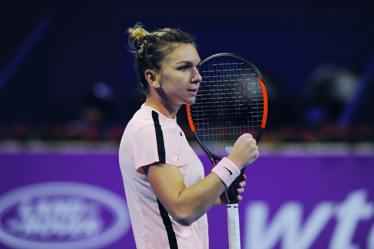 World number two Simona Halep of Romania, celebrates after winning her match against to Catherine Bellis of USA, during their match in the Qatar Total Open 2018 at the Khalifa Tennis and Squash Complex in Doha yesterday.  Pic: Salim Matramkot/The Peninsul