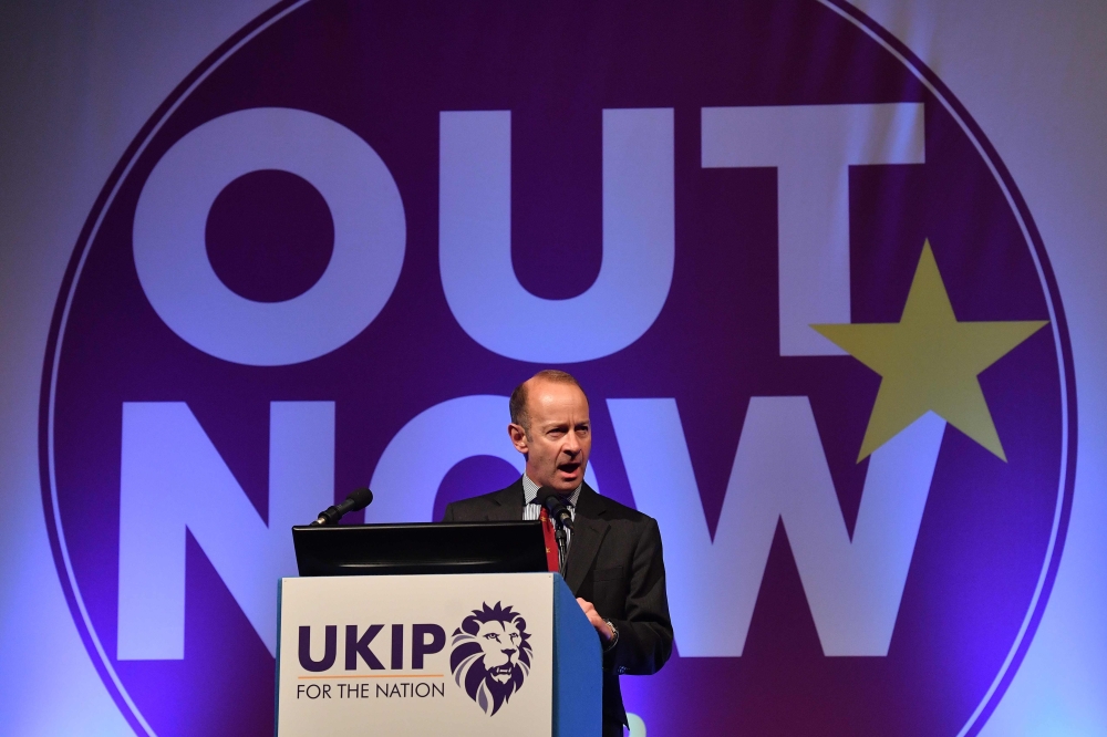 (FILES) In this file photo taken on September 29, 2017 UK Independence Party's newly elected leader, Henry Bolton greets delegates on the first day of the UK Independence Party (UKIP) National Conference in Torquay, south-west England, on September 29, 20