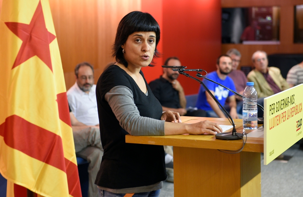 (FILES) In this file photo taken on October 08, 2015 CUP Catalan political party's deputy Anna Gabriel speaks during a conference to present their conditions to negotitate with the Catalan coalition 'Junts pel Si' (Together for the Yes) after the regional