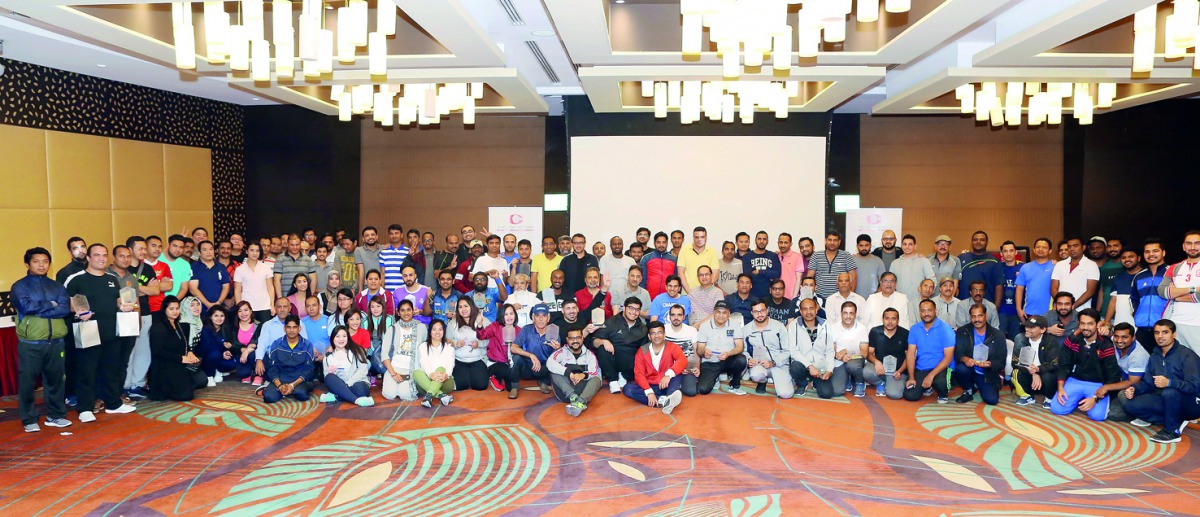 Gulf Exchange staff and management during the National Sport Day celebrations.