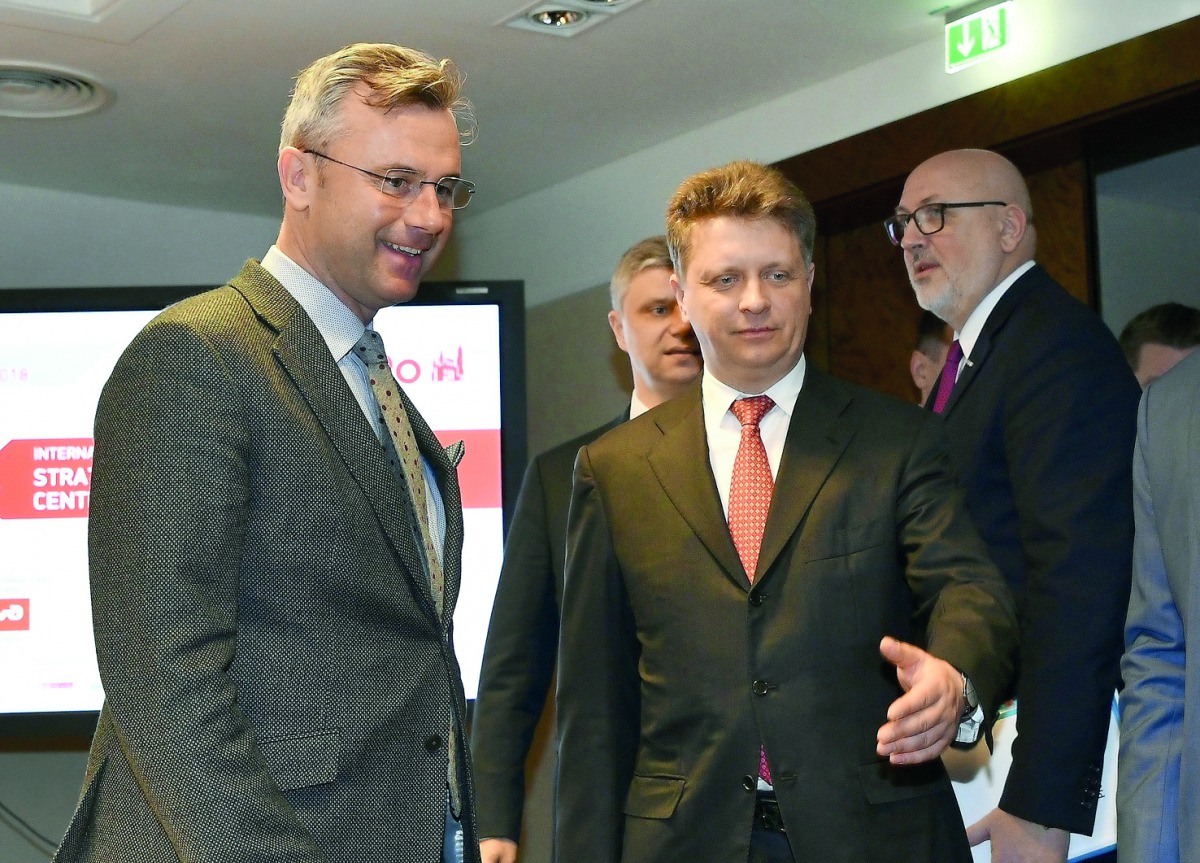 Austrian Minister of Transport Norbert Hofer (L) and Russian Minister of Transport Maxim Sokolov arrive for a signing ceremony of a cooperation agreement on freight transport between Austrian railways and Russian railways on February 21, 2018 in Vienna, A