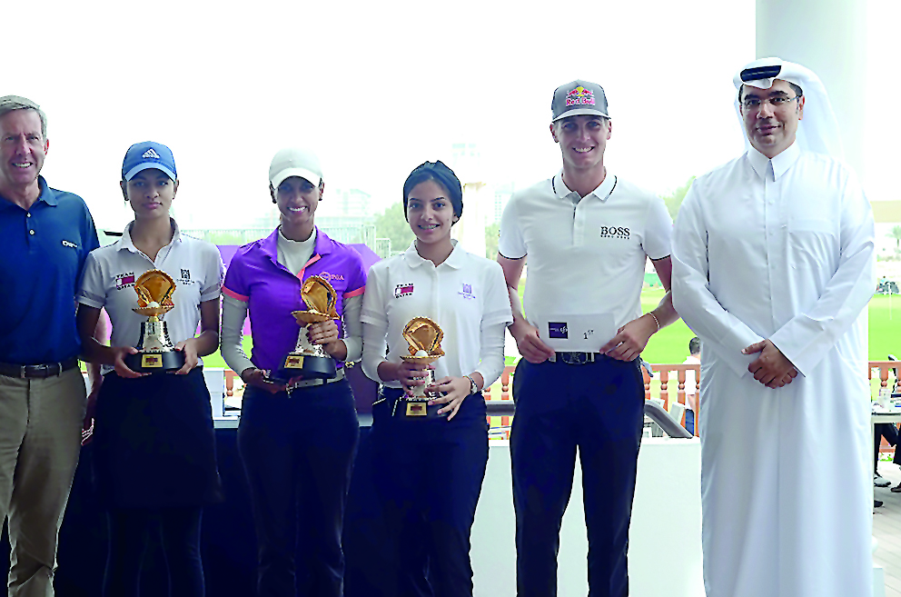 The winning QGA Team of the Commercial Bank Qatar Masters  Pro-Am with professional Matthias Schwab of Austria, (second right), with Hussein Al Abdulla, Commercial Bank of Qatar, Chief Marketing Officer (right) and Keith Waters, Chief Operating Officer of