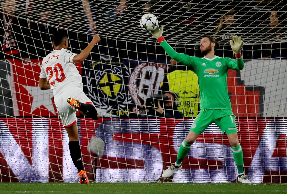 Manchester United's David De Gea makes a save from Sevilla’s Luis Muriel REUTERS/Jon Nazca
