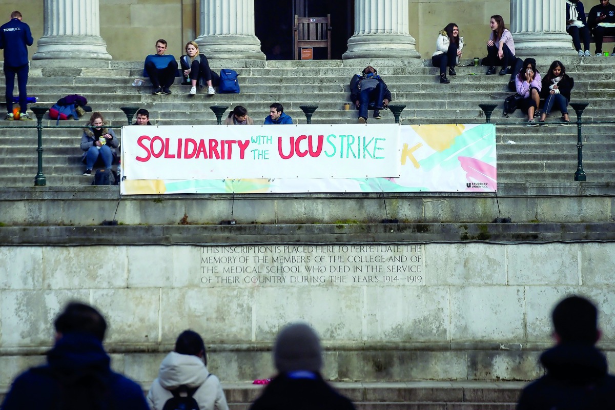 A banner supporting lecturer strikes is displayed outside the University College of London, Britain February 22, 2018. Reuters/Peter Summers 