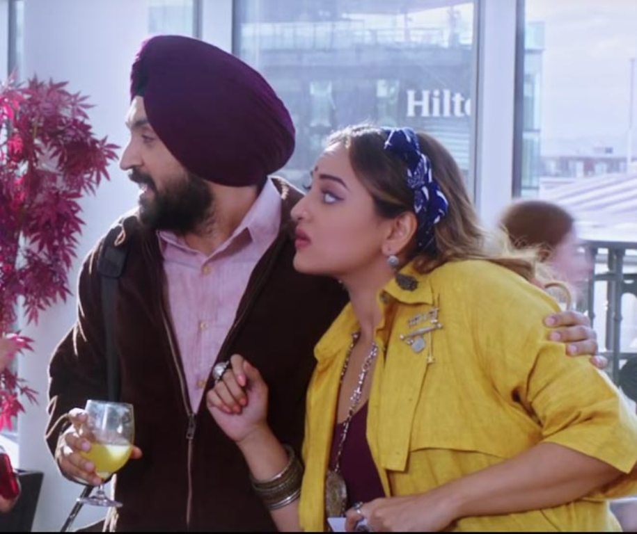 A still of the actors Diljit Dosanjh (L) and Sonakshi Sinha from the movie 