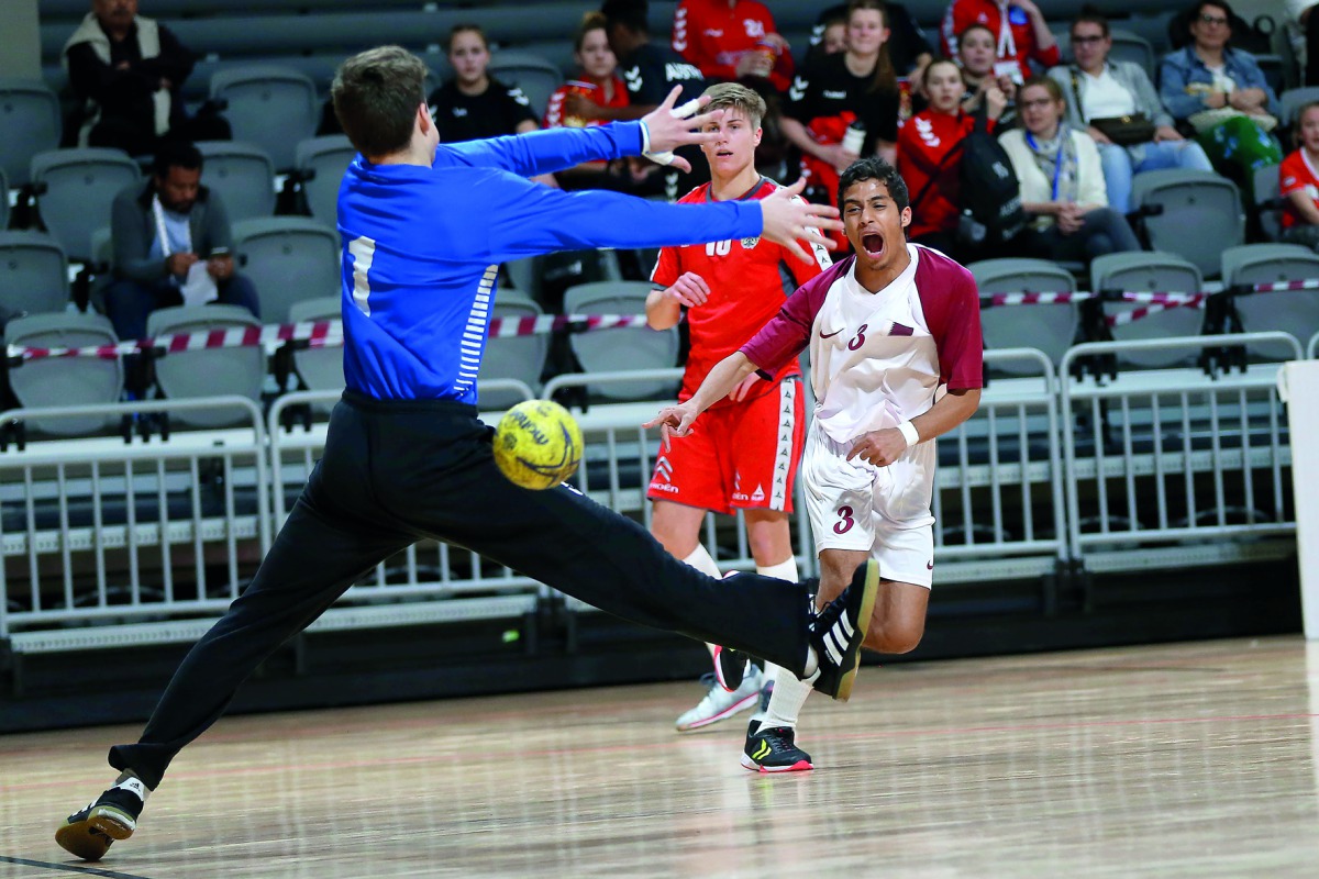 Action from the 24th ISF World Schools Handball Championships match between Qatar and Austria at Ali bin Hamad Al Attiyah Stadium in Al Sadd yesterday.