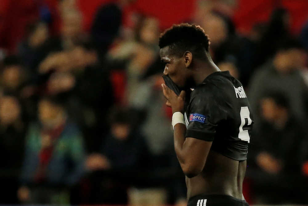 Manchester United's Paul Pogba looks dejected after the match REUTERS/Jon Nazca
