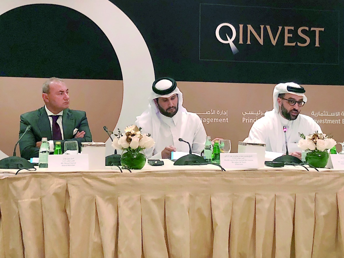 Sheikh Jassim bin Hamad bin Jassim bin Jaber Al Thani (centre), Chairman of QINVEST announcing the group’s 2017 financial results  in the presence of  Tamim Hamad Al Kawari (right), CEO , QINVEST; and Bassel Gamal, Board Member. 