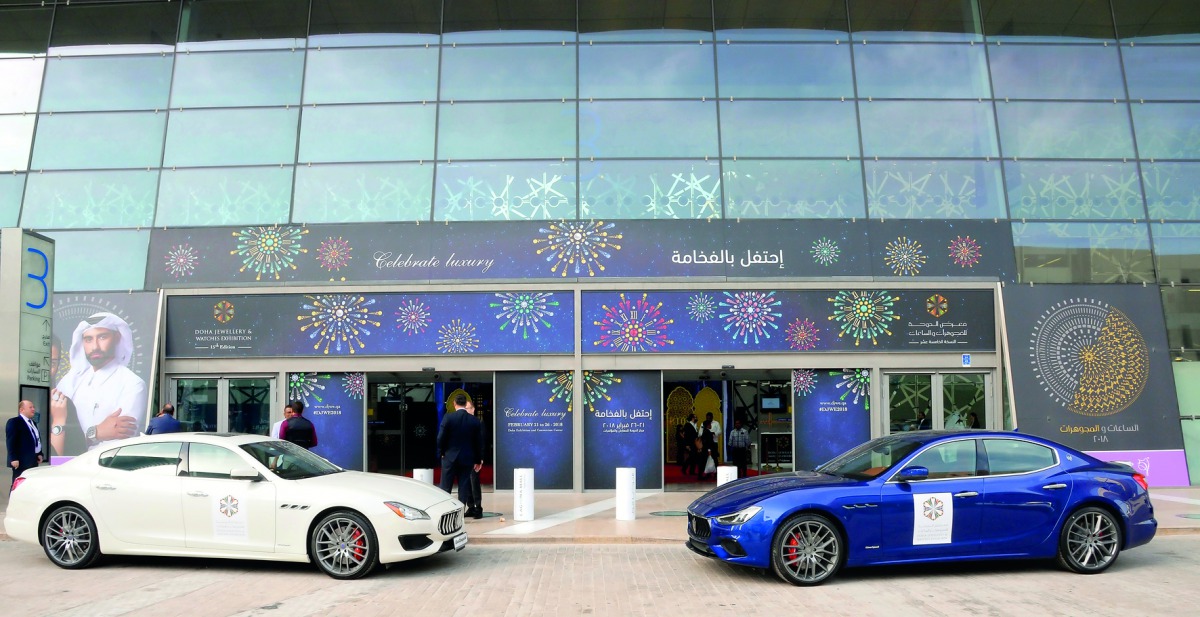 Maserati cars waiting outside the exhibition venue.