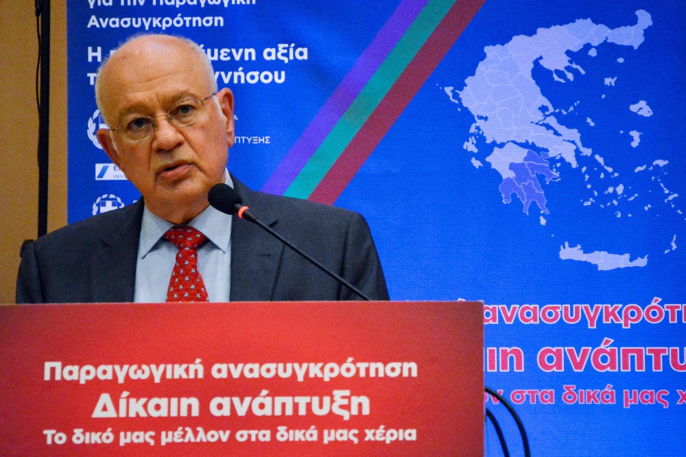 Greece's economy minister Dimitri Papadimitriou speaks during a conference on economic development in Tripoli in Peloponnese region on February 26, 2018. / AFP / Eurokinissi / STR 