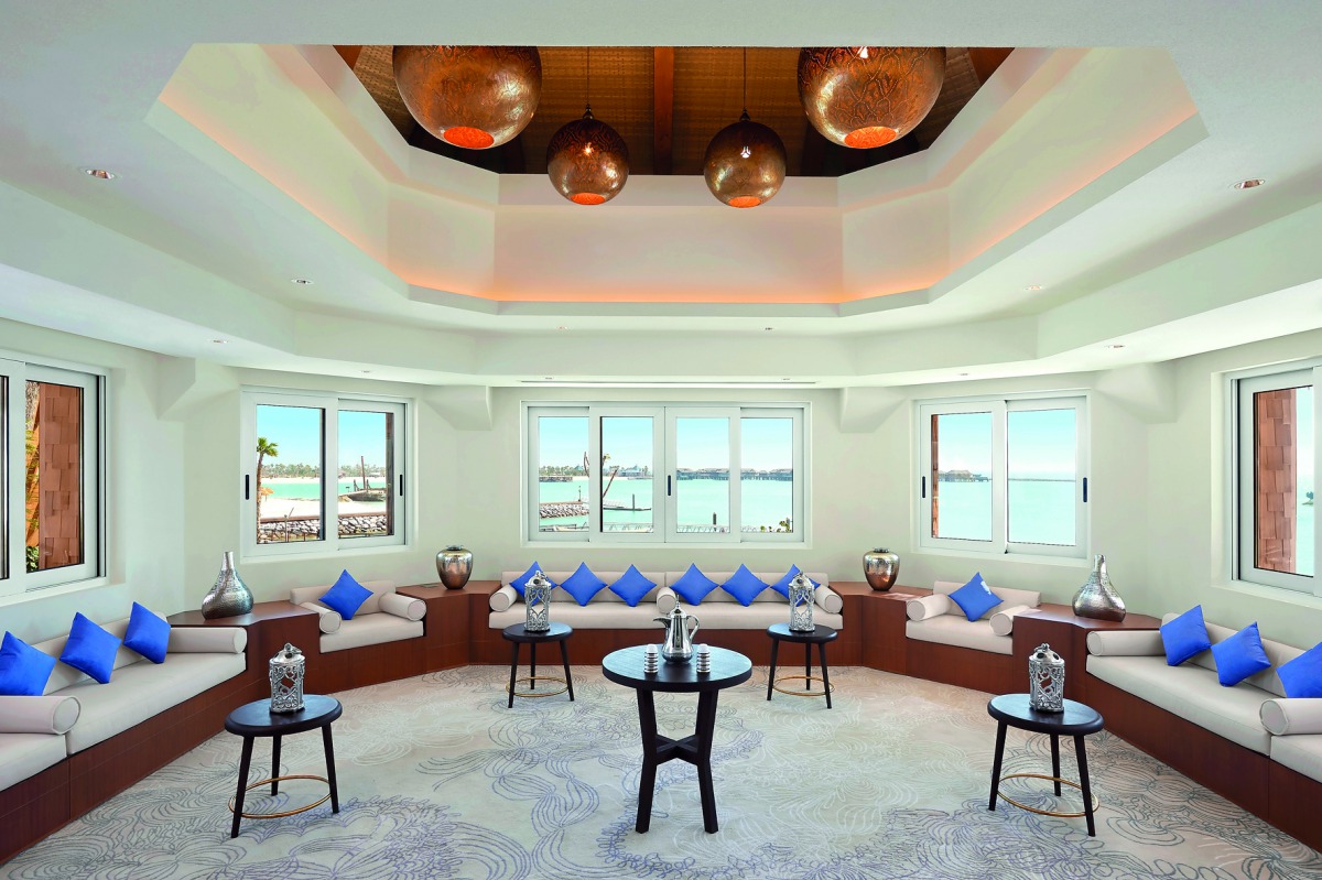 A view of a majlis-style meeting room at Banana Island Resort Doha by Antara.
