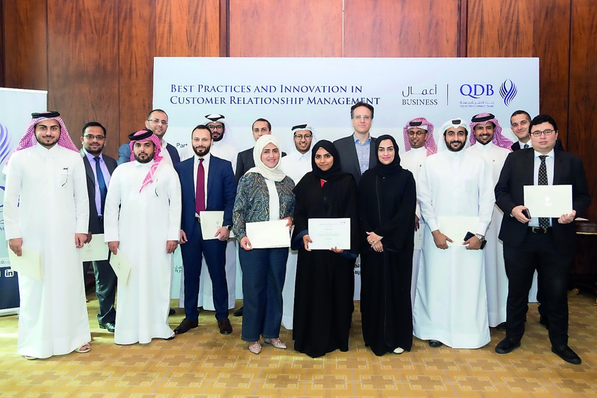 Officials and participants at the QDB training session on ‘Best Practices and Innovation in Customer Relationship Management.’