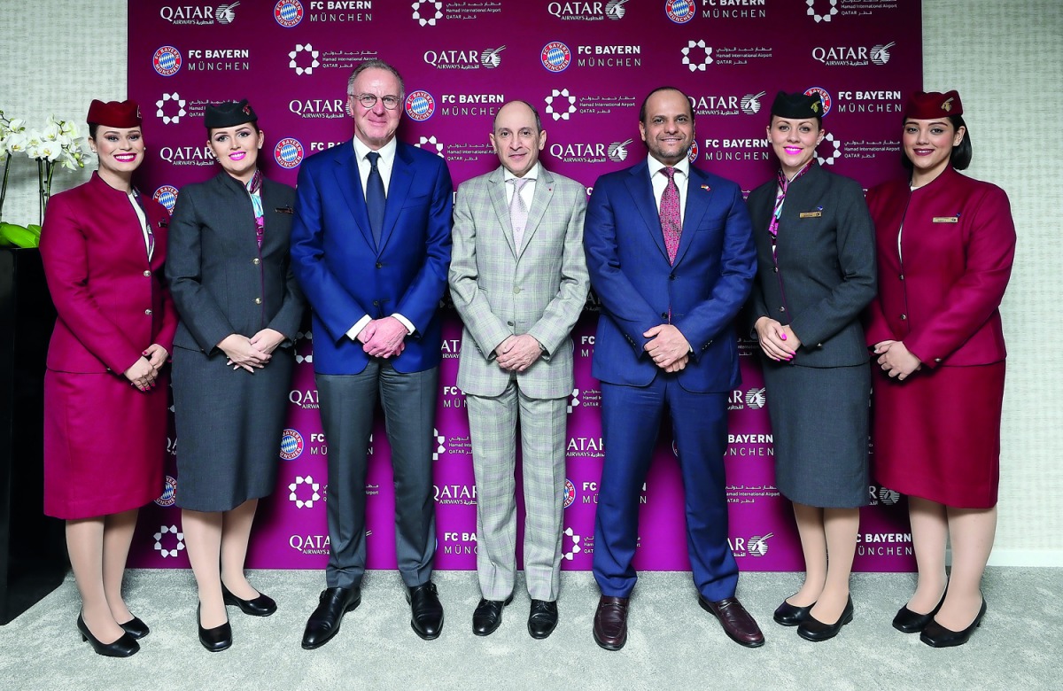 Qatar Airways Group Chief Executive Akbar Al Baker (centre), with Chairman of the Board of FC Bayern Munich, Karl-Heinz Rummenigge (third left), after the announcement at ITB in Berlin,  yesterday.