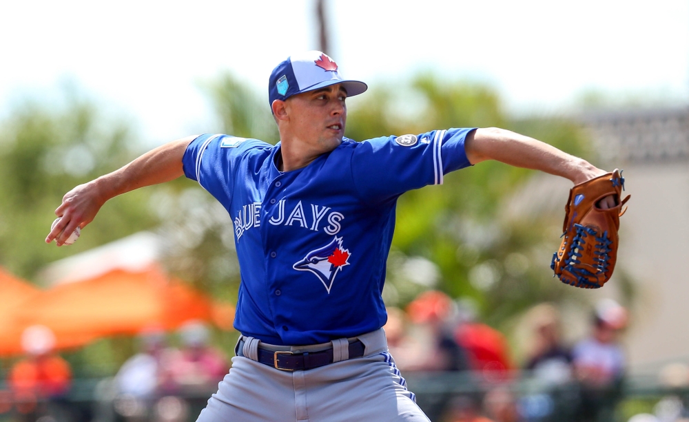 Toronto Blue Jays starting pitcher Aaron Sanchez (41) throws a pitch during the first inning of a Spring Training baseball game against the Baltimore Orioles at Ed Smith Stadium. Mandatory Credit: Butch Dill-USA Today Sports