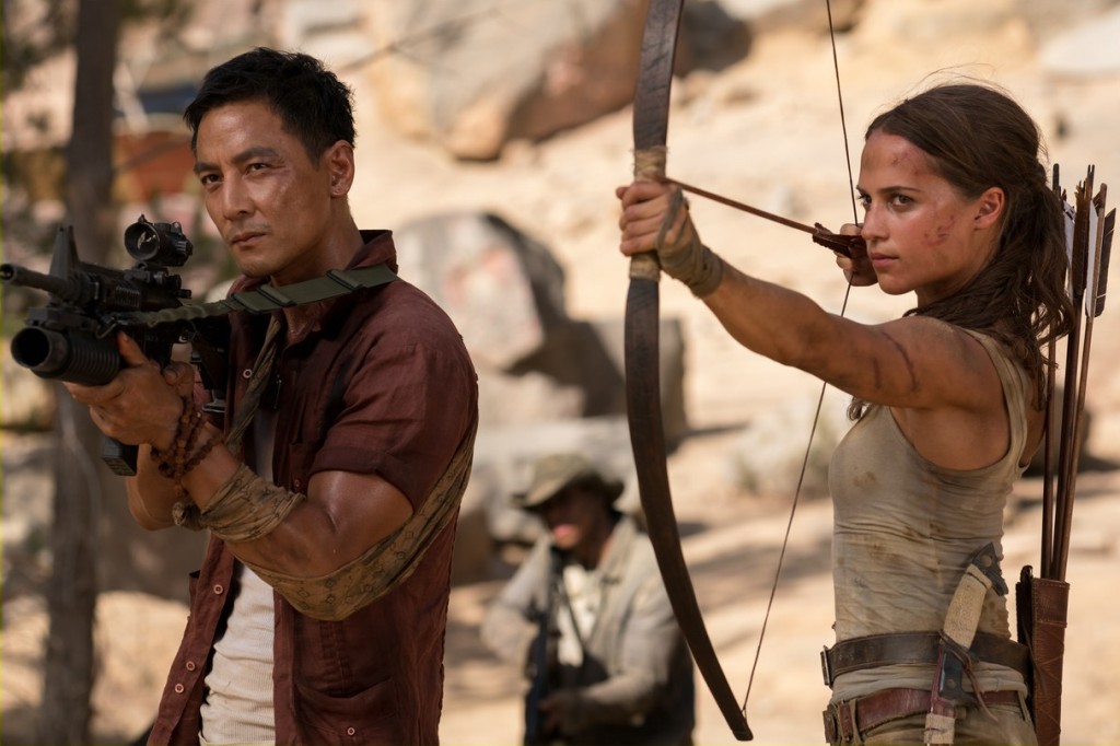 A still of the actors Alicia Vikander (R) and Daniel Wu from the movie Tomb Raider.