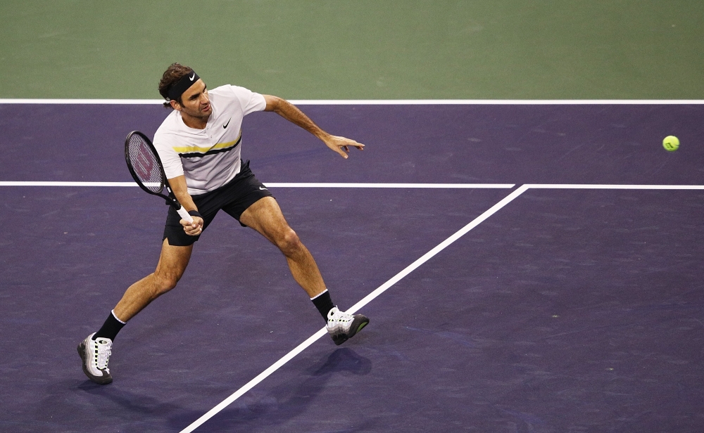 Roger Federer of Switzerland hits a forehand during his match against Federico Delbonis of Argentina during the BNP Paribas Open at the Indian Wells Tennis Garden on March 10, 2018 in Indian Wells, California. Adam Pretty/Getty Images/AFP 