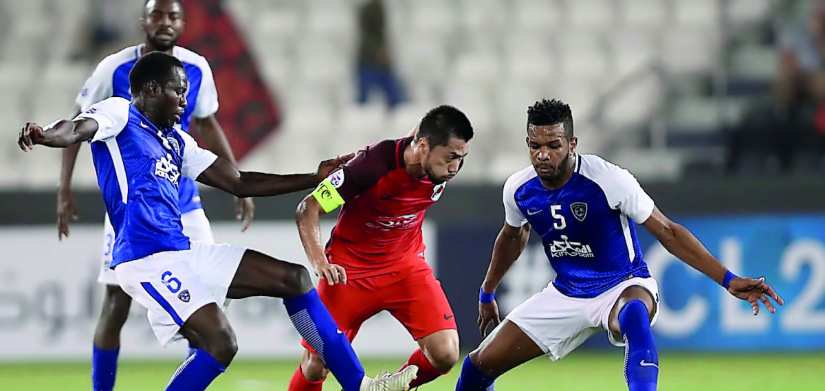 Action from the AFC Champions League match between Al Rayyan and Al Hilal in Doha yesterday.