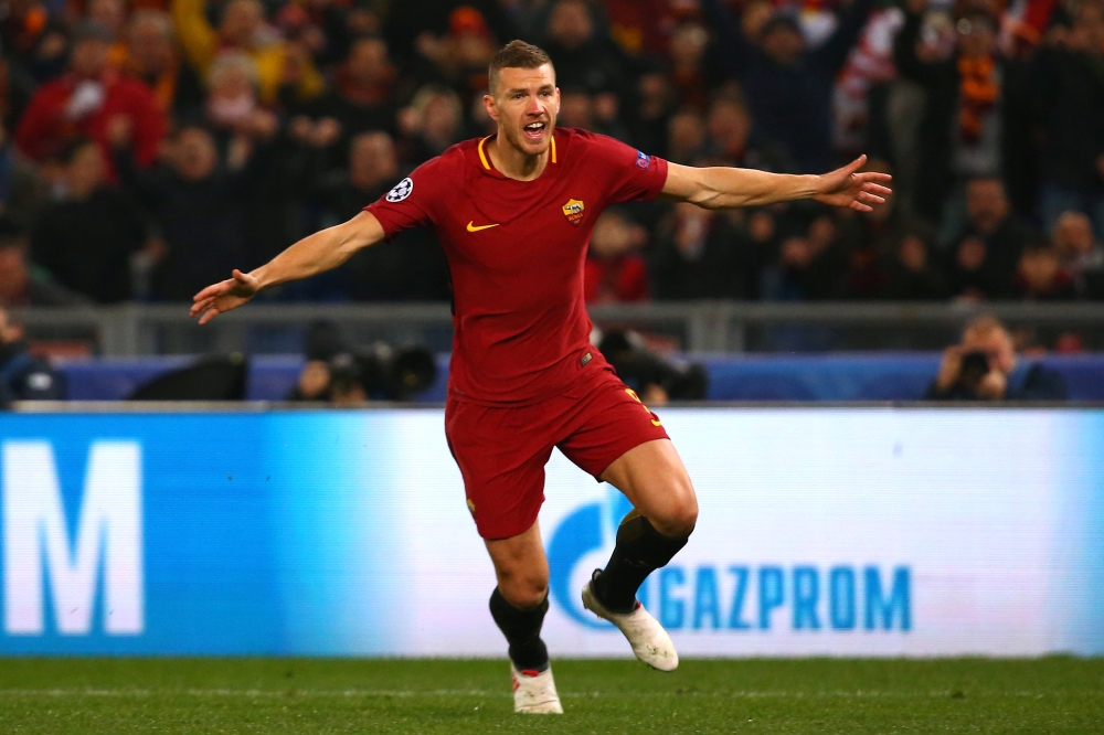 Roma's Edin Dzeko celebrates scoring their first goal. Champions League Round of 16 Second Leg - AS Roma vs Shakhtar Donetsk - Stadio Olimpico, Rome, Italy - March 13, 2018 Reuters/Alessandro Bianchi