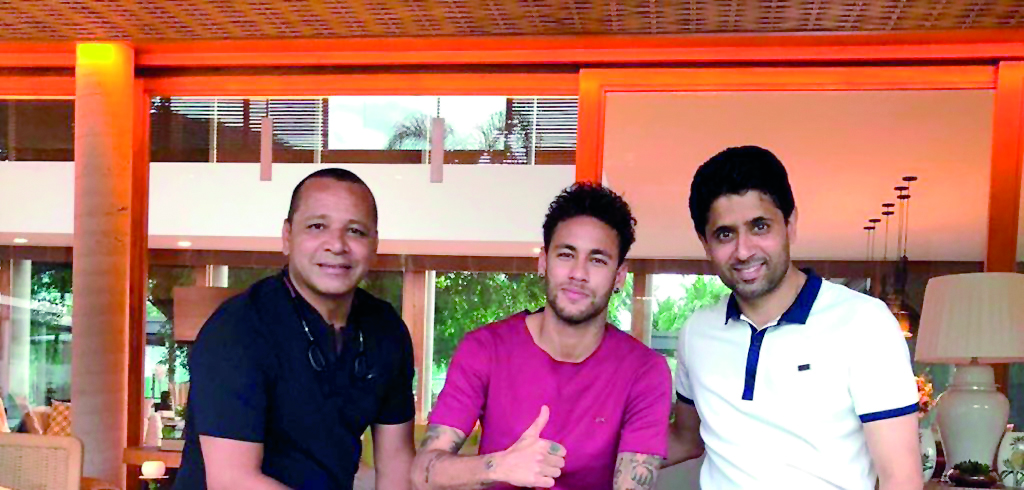 PSG President Nasser Al Khelaifi, Neymar (centre) and his father Neymar Santos (left) pose for a picture in Sao Paulo, Brazil yesterday. 