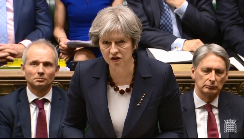 :A video grab from footage broadcast by the UK Parliament's Parliamentary Recording Unit (PRU) shows Britain's Prime Minister Theresa May 
